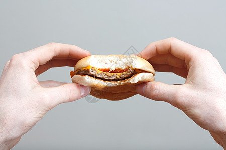男人吃汉堡包菜单晚餐饮食小吃餐厅午餐垃圾牙齿肥胖食物图片