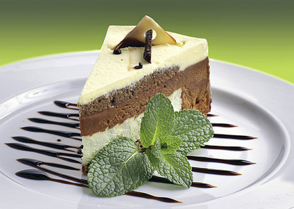 蛋糕白色巧克力庆典食物奶油糖果糕点美食甜点叶子图片