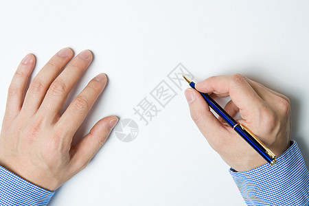 书面写作的人职业商务手指训练人士办公室经理蓝色笔记商业图片