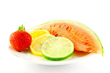 含有草莓和梅龙的柑橘水果食品营养早餐生产盘子柠檬西瓜植物收成果汁图片