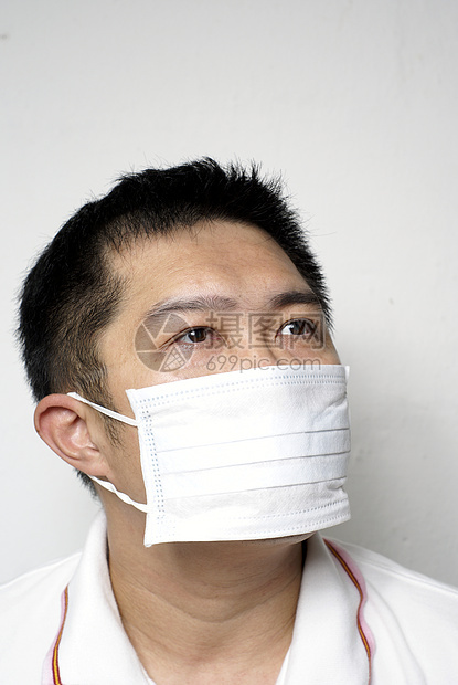 戴医疗面具的亚裔男子肖像卫生成人口罩外科预防男性呼吸传染性疾病图片