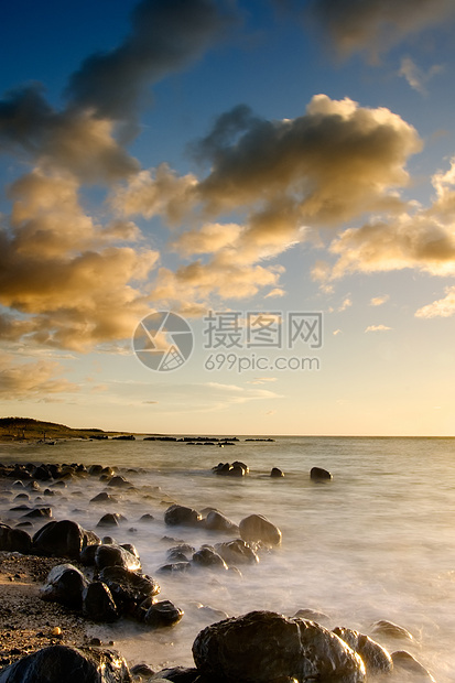 珊瑚礁海岸线的日落太阳珊瑚海景游客沿海海洋天空天堂岩石海岸图片