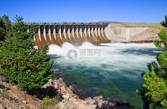 大泰顿的杰克逊湖大坝天空旅行晴天旅游蓝色游客日出反射公园山脉图片