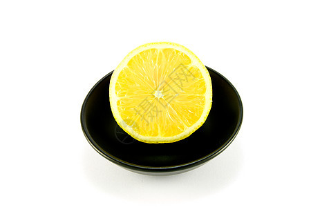 半柠檬白色黄色盘子饮食营养水果图片