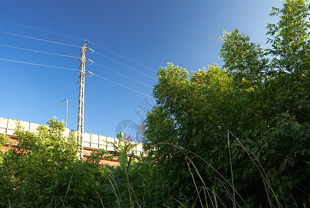 电塔电缆建筑蓝色电压城市天空工程建筑学环境工业图片