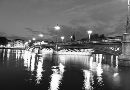 斯德哥尔摩市夜幕现场窗户渡船天空棕褐色运输首都公园建筑港口地区图片