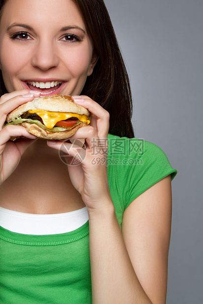 妇女吃汉堡包饮食午餐成人微笑女性营养黑发背景女孩食物图片
