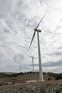 叶子能量 风力发电 通过风力涡轮机发电机燃料线圈翅膀蓝色涡轮力量风车白色刀刃图片