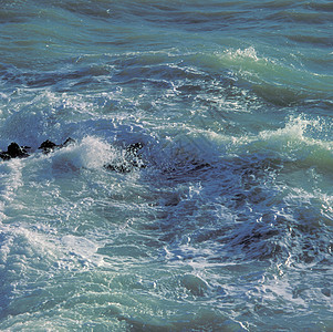 波浪海岸海滩岩石海洋图片
