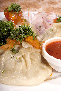 热亚洲菜享受营养洋葱餐厅盘子沙拉国家晚餐烹饪美食图片