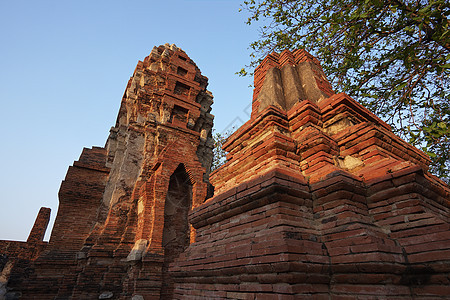 泰爱兰 阿尤塔亚 日落时城古寺庙的废墟建筑学佛教徒风景天空宗教旅行纪念碑历史性假期历史图片