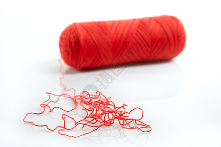 红线串在白线上分离材料主妇裁缝绳索闲暇红色工艺纺织品宏观缝纫图片