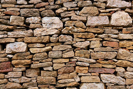 西班牙的共济会 旧石墙城堡橙子城市裂缝石头砂浆石工墙纸材料水泥图片