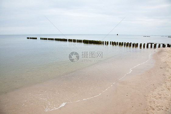 隔水风暴海浪防御海滩海洋天气地平线木头障碍支撑图片