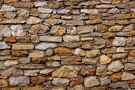 西班牙的共济会 旧石墙石头砂浆墙纸橙子材料建筑学城市水泥城堡石工图片