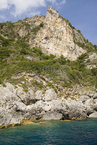 科孚希腊蓝色旅游异国旅行场景岩石阳光国家风景避暑胜地图片