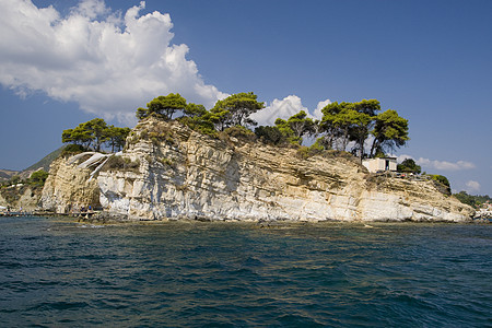 希腊天空蓝色阳光假期避暑胜地娱乐绿色石灰石国家异国图片