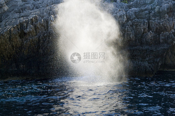 希腊避暑胜地天空石灰石绿色岩石异国海岸线旅行蓝色阳光图片