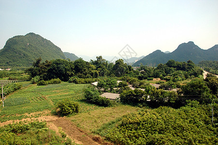 中国地貌     广东清源村庄场地农场农村丘陵农业树木池塘绿色种植园图片