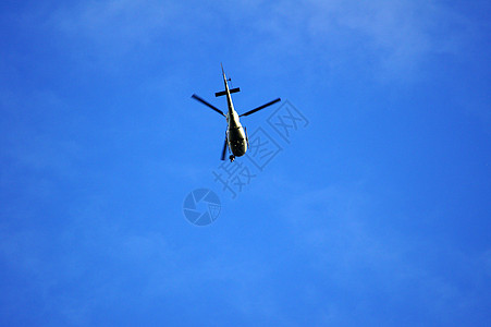 直升机飞行车辆菜刀螺旋桨天空刀片蓝色旅行航班刀刃运输图片