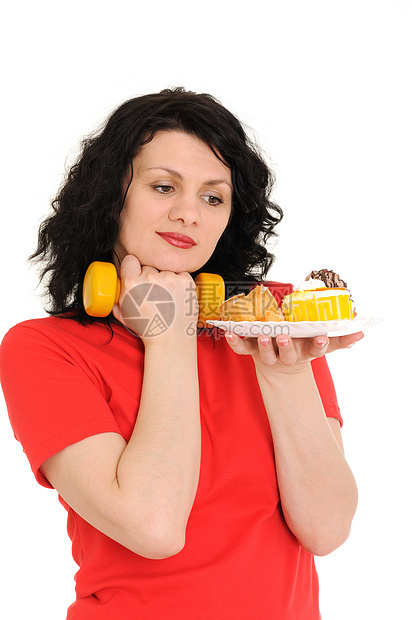 有哑铃的女子成人健康女士馅饼盘子黄色糕点红色黑发奶油图片