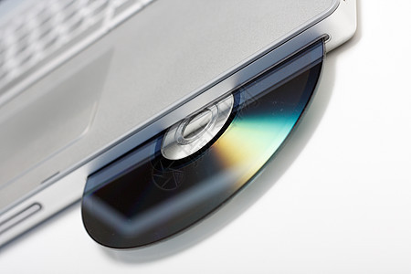 CD驱动器电脑笔记本袖珍展示烧伤作品磁盘白色键盘金属图片