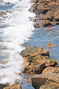 岩石海岸海浪海洋土地地平线椰子热带假期游泳太阳旅行图片