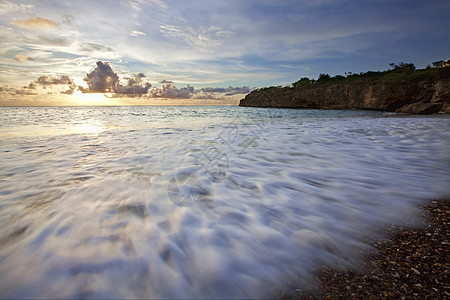 库拉索岛日落海湾天堂海滩波浪天空海洋海景风景海岸悬崖图片