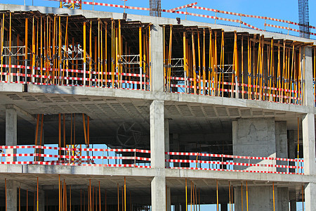 建筑工地建筑物格子金属建筑学脚手架生长起重机工业城市建造图片