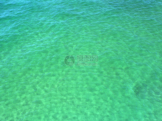 绿宝石水背景绿色液体水晶蓝色国家岩石活力湖岸图片