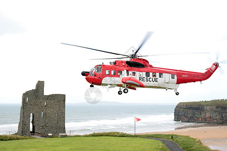 海上救援悬浮服务旅行帮助天空直升飞机海王菜刀悬崖城堡旗帜图片