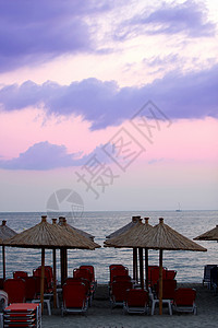 希腊的海洋和日出光束日落金子太阳日光假期天堂天气阳光热带图片