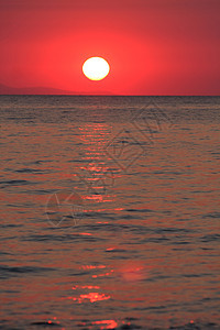 希腊日出太阳旅游热带海洋光束阳光日落海浪金子天气图片