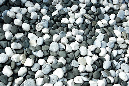 圆形齿状石材料灰色石头力量历史岩石花园矿物宏观白色图片