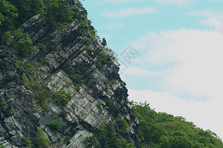 山区蓝色运动天空公园岩石孤独季节山坡场景爬坡图片