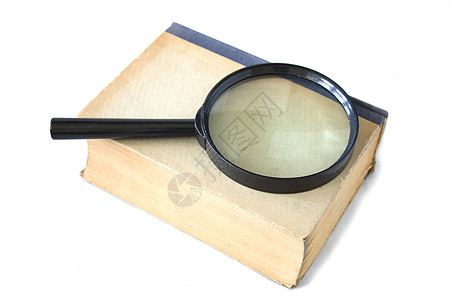旧书和放大镜侦探检查探险家阅读镜片光学学习白色调查工具图片