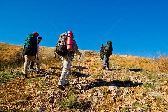 爬山的偷渡者游客成人远足天空接待首脑爬坡远足者旅行旅游图片