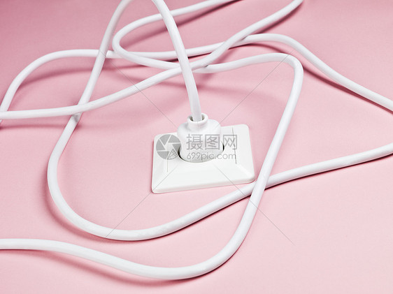 电动电缆特色家居粉红墙功能电子力量电源线白色辅助摄影图片