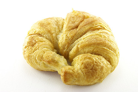 Croissunt 孔滴鞋垫面包新月薄片传统糕点小吃午餐面团美食图片