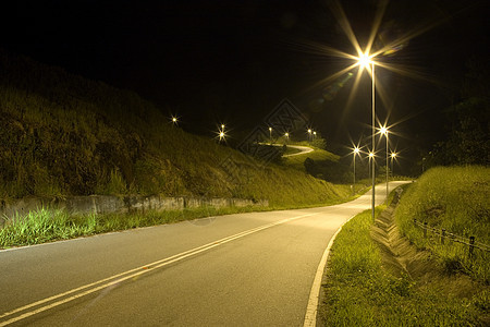 夜间热带乡村公路  夜间道路农村运输旅行街道沥青孤独车道爬坡图片