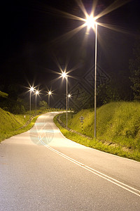 夜间热带乡村公路  夜间沥青孤独道路运输农村旅行街道爬坡车道图片