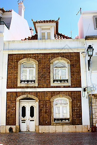 里斯本的传统住宅和传统住宅建筑Lisbon街道瓷砖明信片市中心旅游红色城市洗衣店房屋活力图片