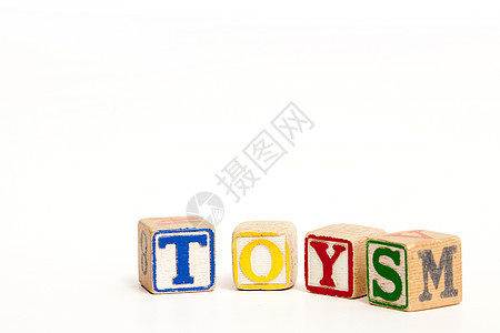 玩具立方体幼儿园教育孩子们白色古董木头字母学校拼写背景图片