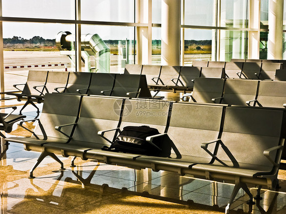 无人看管行李安全旋转木马商业旅游游客飞机场旅行运输案件航空图片