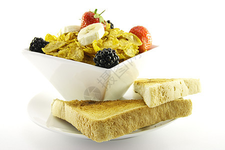 玉米花和水果与吐司早餐浆果饮食小吃面包薄片午餐营养蜂蜜牛奶图片