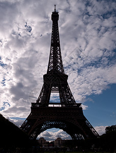艾菲尔铁塔的轮光天际城市纪念碑旅行天空地标历史性旅游建筑学蓝色背景