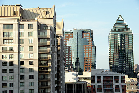 加拿大蒙特利尔的摩天大楼窗户宗教天空建筑物反射场景房子街道市中心建筑图片