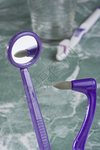 牙科设备紫色医疗乐器橡皮矫正镜子工具护理健康卫生图片