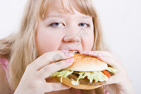 带汉堡包的胖女孩图片