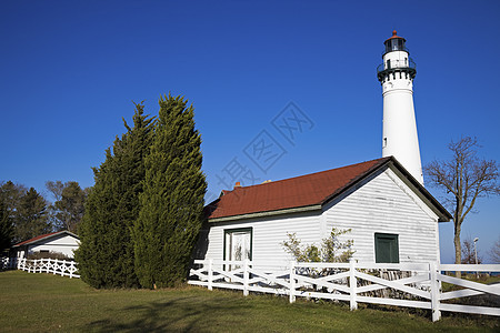 风点灯塔历史性白色天空蓝色旅行窗户房子图片